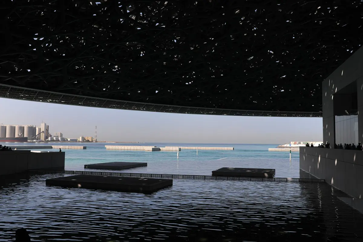 The dome of the Louvre Abu Dhabi above the water