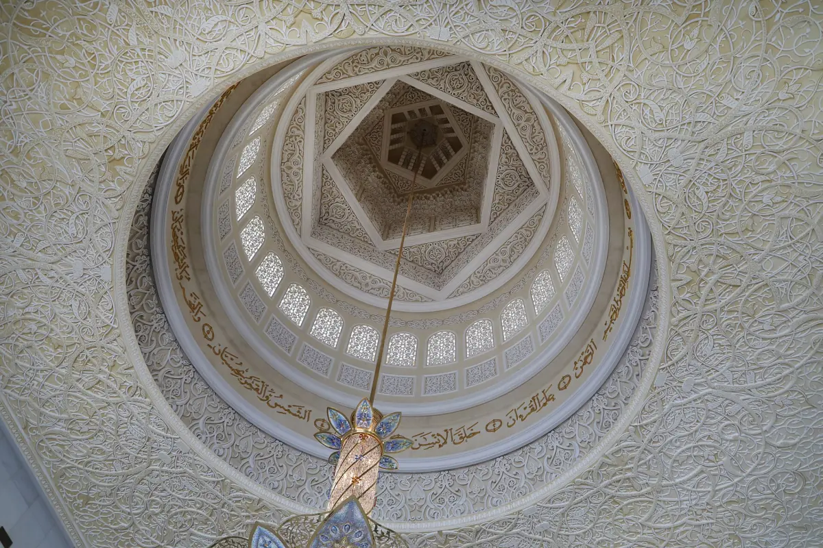 Carved dome and lamp in the atrium of the prayer hall