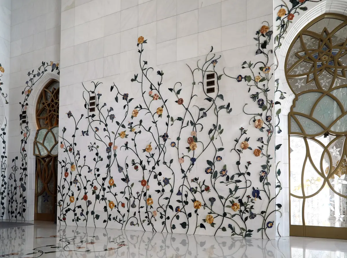 Floral inlay on a marble wall of the mosque